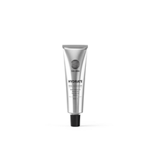 Eine silberne Tube DALUMA FACIAL MOISTURIZER GESICHTSPFLEGE steht aufrecht mit schwarzer Kappe und minimalistischem schwarzen Text auf weißem Hintergrund. Diese natürliche Feuchtigkeitscreme hydratisiert, erfrischt, und ist für jeden Hauttyp geeignet.
